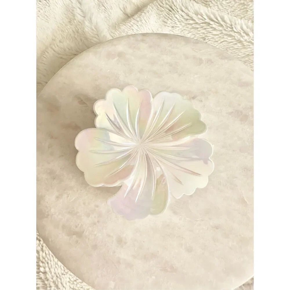 Iridescent white hibiscus flower hair claw